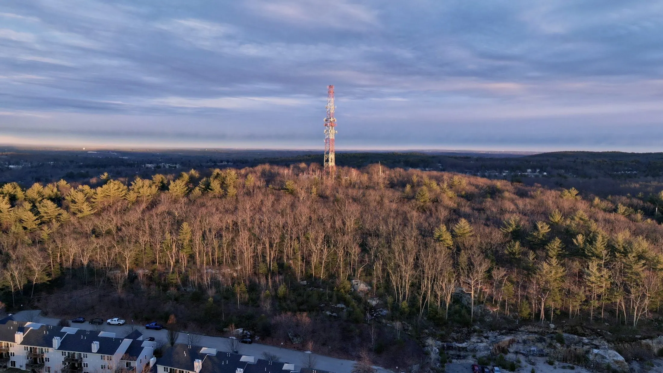 An aerial photograph of New England woodland in autumn